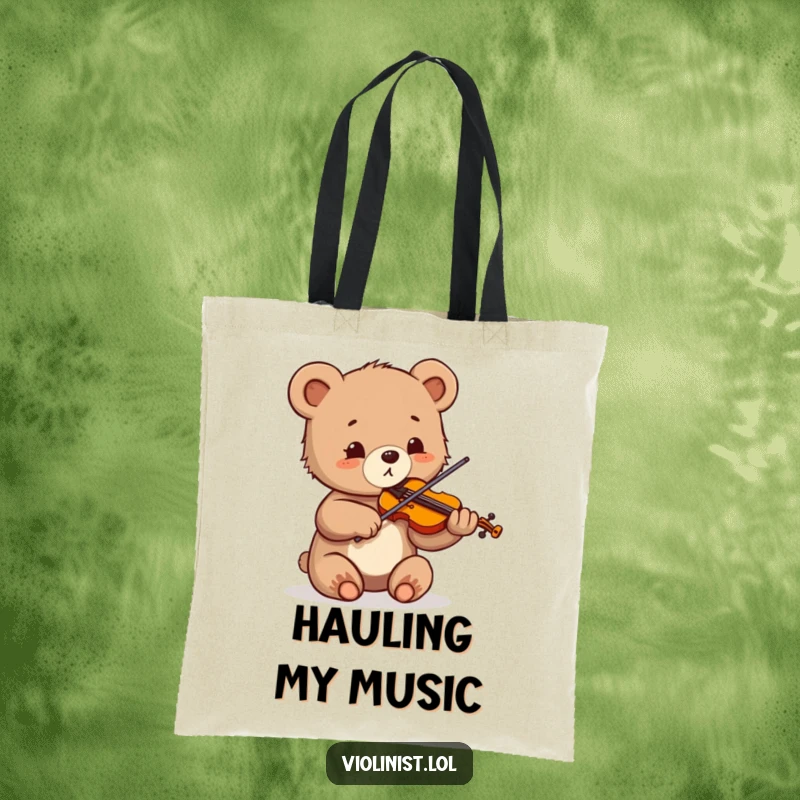 Funny tote bag depicting a small bear cub enthusiastically playing the violin with wide, utterly delighted eyes.