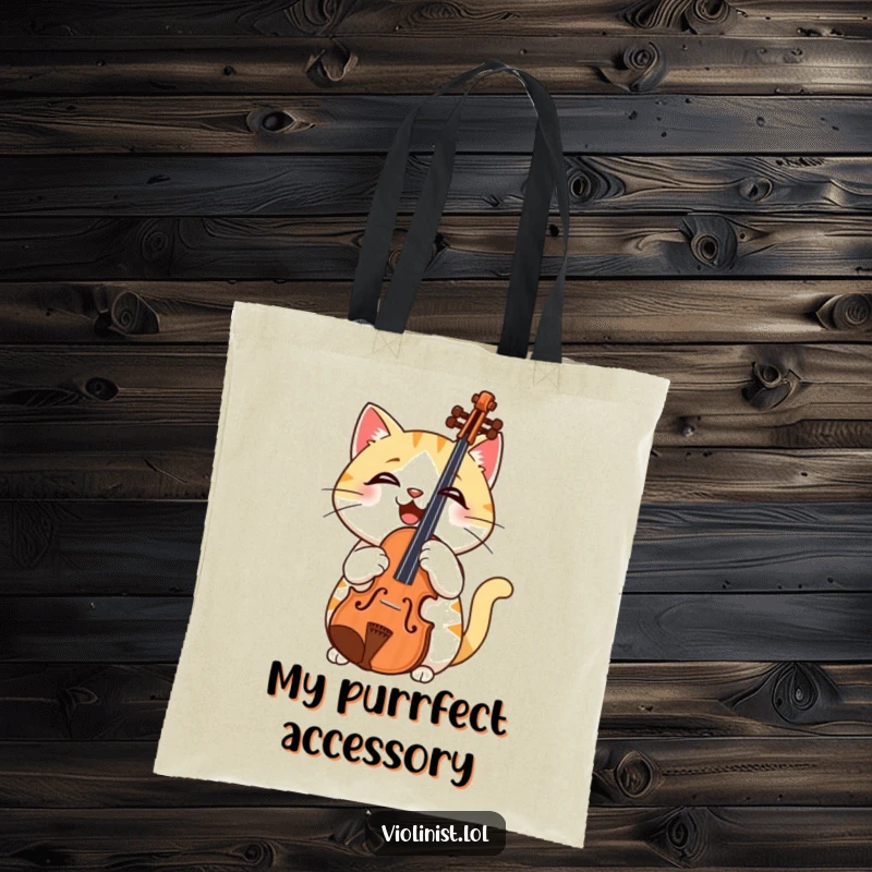 Funny tote bag illustration of a confused cat holding a violin the wrong way, adding a whimsical touch to your day.